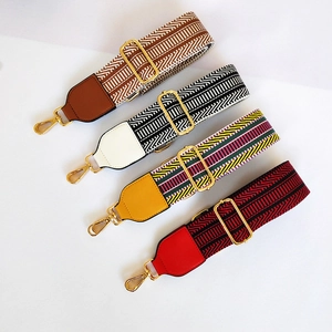 Ethnic style embroidered replacement bag straps with colorful patterns and gold buckles