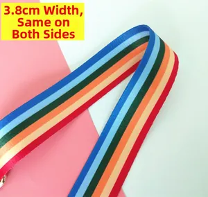 Detail of 3.8cm wide rainbow striped woven strap showing a reversible and durable design