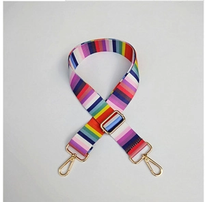 Adjustable rainbow striped nylon bag strap with gold lobster clasps and metal buckle