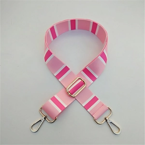 Adjustable pink and white striped wide replacement strap for handbags with gold hardware