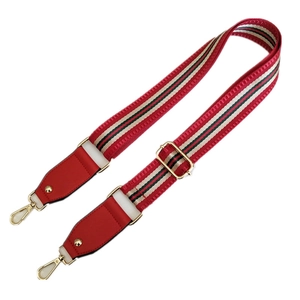 Adjustable wide woven shoulder strap with red stripes and gold metal buckles for handbags