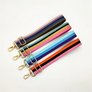 Adjustable striped fabric bag straps with gold metal hardware in four colorful patterns