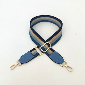 Adjustable striped fabric shoulder strap with gold metal hooks for crossbody bags