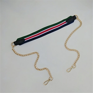 Detail of colorful striped woven strap with golden chain links and lobster clasps