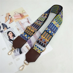 Adjustable geometric woven bag strap with colorful ethnic pattern and gold hooks