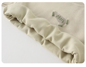 Detail of baby sweatshirt featuring thick fleece lining and YOOLA 3D embroidery detail
