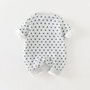 Cute polka dot baby romper with long sleeves and ribbed cuffs in light green