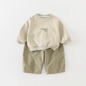 Minimalist Korean style beige toddler sweatshirt with YOUTH embroidery and khaki green shorts