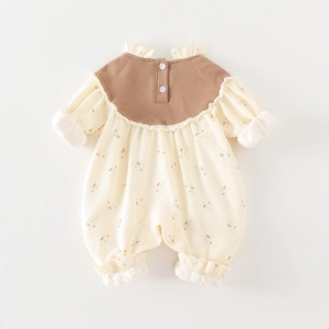 Floral long-sleeve baby romper with corduroy patchwork and ruffled edges for autumn