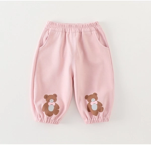 Close-up of pink toddler jogger pants with cute brown bear prints and elastic waistband