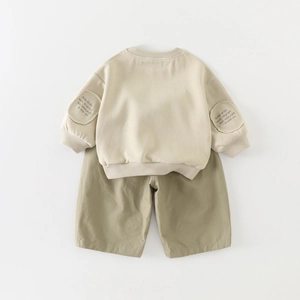 Toddler boys autumn beige sweatshirt and olive green shorts set in minimalist style