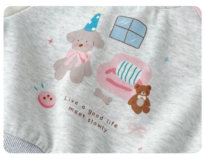 Detailed view of grey baby sweatshirt fabric texture with cute cartoon animal prints