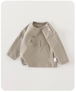 Detail of baby khaki long sleeve tee with shoulder buttons and bear coffee menu print