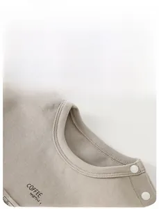 Detail view of cotton long sleeve t-shirt with ribbed neck and coffee print for toddlers