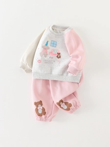 Two-piece baby girl tracksuit featuring cute bear print and contrast color sleeves