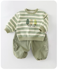 Detail of baby boy striped sweatshirt with Magic tree print and matching green joggers