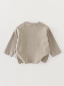 Toddler long sleeve round neck cotton knit shirt in khaki shown in a flat lay view