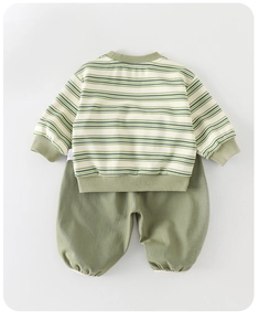 Flat lay of baby boy tracksuit with green striped sweatshirt and matching jogger pants