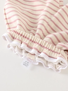 Pink striped baby cotton pants with elastic waist and ruffled white trim detail