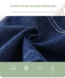 Gros plan du tissu denim bleu foncé doux avec coutures blanches pour salopette bébé