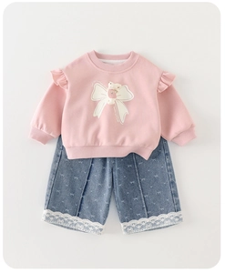 Toddler girl two-piece set featuring pink rabbit sweatshirt and lace-trimmed denim shorts