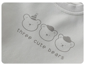 Detail of three cute bears print on gray cotton sweatshirt with ribbed collar