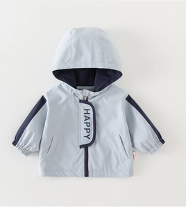 Detail of kids hooded windbreaker featuring navy contrast sleeves and Happy print zipper