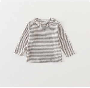 Detail of grey striped long-sleeved baby t-shirt with snap buttons on the shoulder