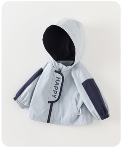 Detail of boys windproof hooded jacket featuring happy letter print and blue color blocking