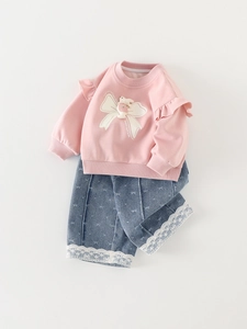 Pink toddler sweatshirt with ruffles and denim jeans set featuring lace trim details