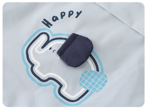Detail of a kids windbreaker showing a blue cartoon elephant patch with a textured 3D ear