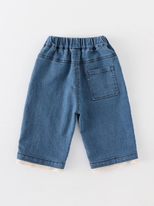 Pantaloni in denim blu per bambine con vita elastica e bordo in pizzo beige rifinito