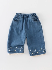 Pantaloni di jeans per bambine con ricami floreali e rifiniture in pizzo chic