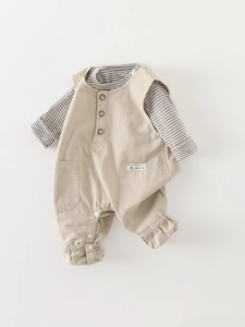 Infant two-piece set with gray striped long sleeve top and beige suspender jumpsuit