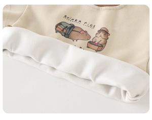 Detailed close-up of warm fleece lining and cute guinea pig print on beige baby sweatshirt