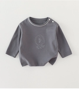 Detail of dark grey baby T-shirt showing round neck with shoulder buttons and clock graphic