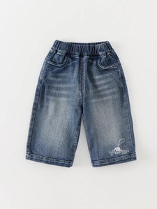 Classic mid-blue kids denim jeans with elastic waist and white cartoon house print