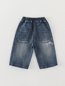 Classic blue wash denim shorts for boys featuring elastic waist and artistic print