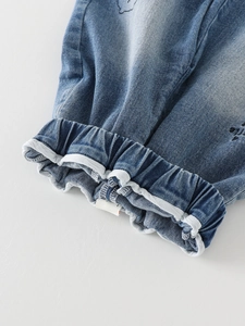 Toddler boys blue washed denim joggers featuring elastic cuffs and detailed embroidery