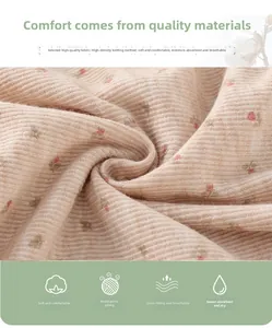 Gros plan sur le tissu tricoté à fleurs haute densité pour gilet en coton doux pour fille