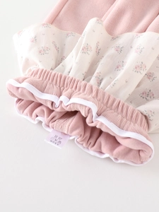 Pink striped toddler girl's sweatshirt set with floral chiffon trim and ribbed cuffs