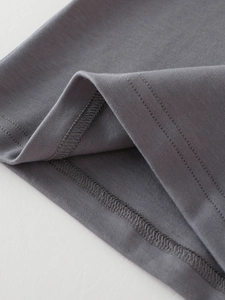 Classic dark grey kids long sleeve t-shirt showing detailed reinforced double-stitch hem