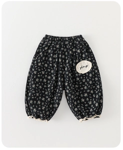 Detail of floral baby bloomers with elastic waist, lace edges and embroidered patch
