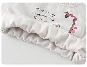 Detail of white cotton sweatshirt with rib-knit cuff and red vintage faucet print
