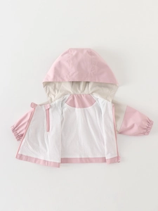 Pink and beige hooded windbreaker jacket for girls with zip closure and elastic cuffs