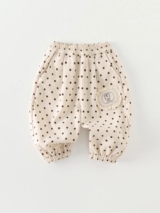 Toddler girls beige polka dot joggers with elastic waist and cute rabbit lace patch