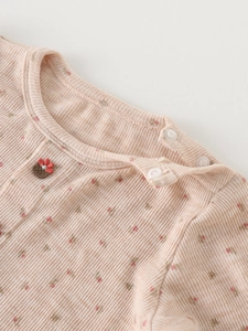 Gilet côtelé rose pour filles avec imprimé floral et boutons-pression sur l'épaule