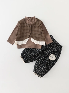 Girl vintage autumn 3-piece set with brown knit vest and floral lace-trimmed trousers