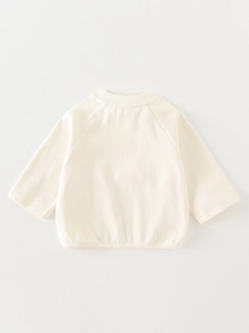 Felpa minimalista bianco crema a maniche lunghe per bambina con girocollo e bordi a costine