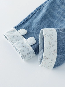 Baby girl denim jeans featuring cute floral lining and 3D ear accents on folded cuffs